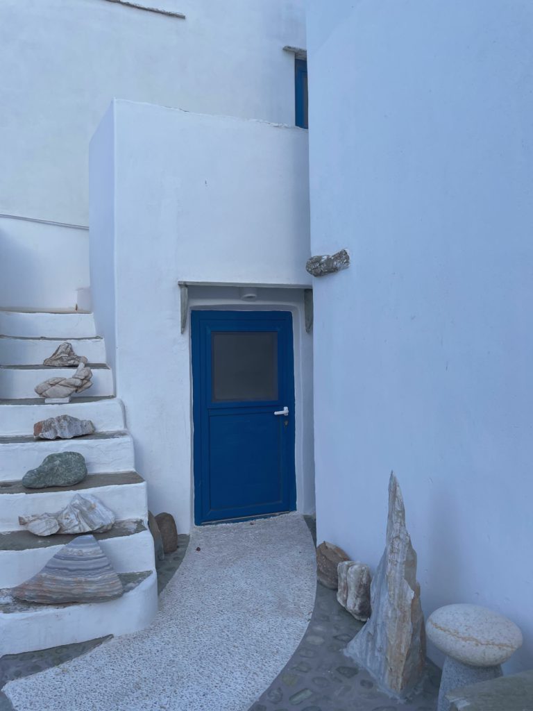 Whitewashed Stair, Blue Door