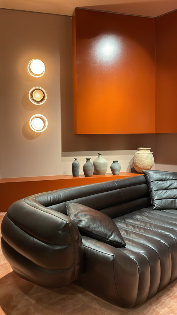 Leather Sofa, Orange Wall