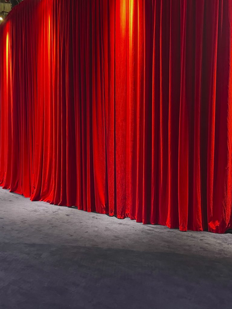 Crimson Curtain Corridor