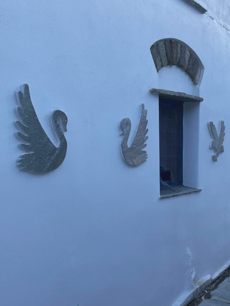 Swans On Blue Wall
