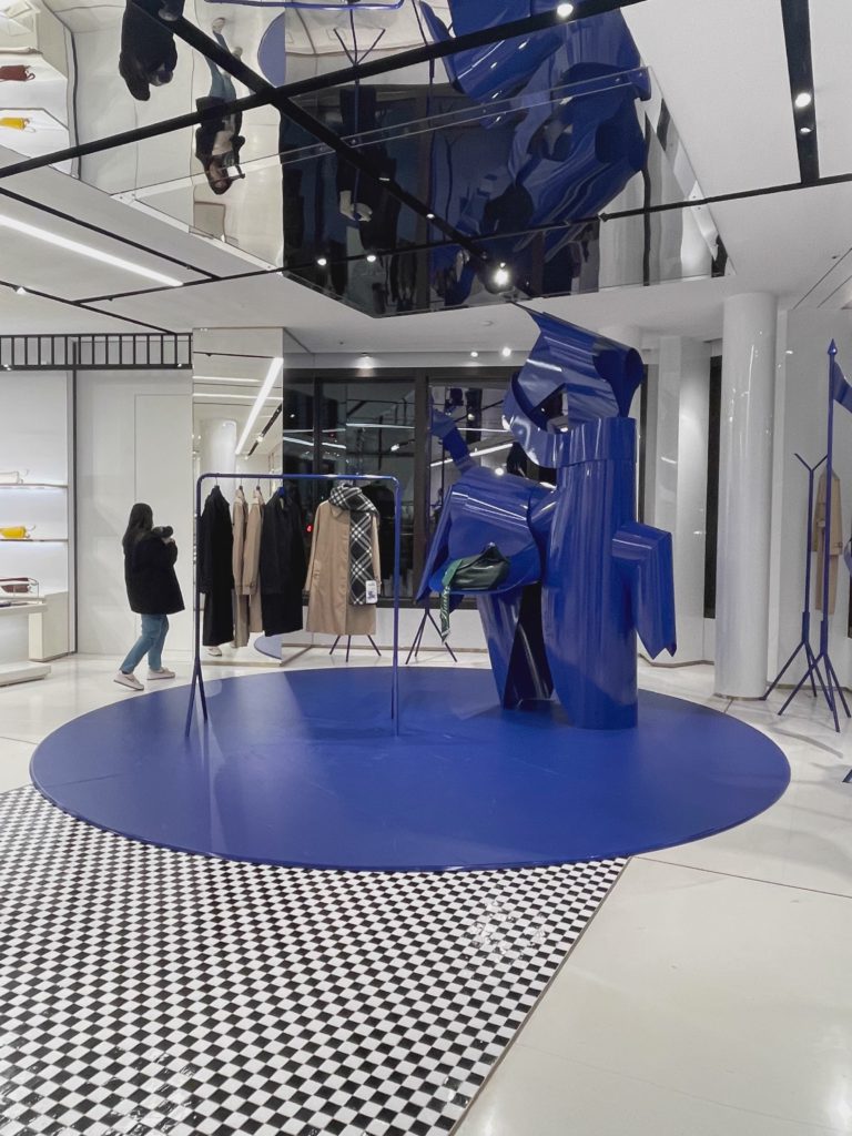 Sculpture On Checkered Floor